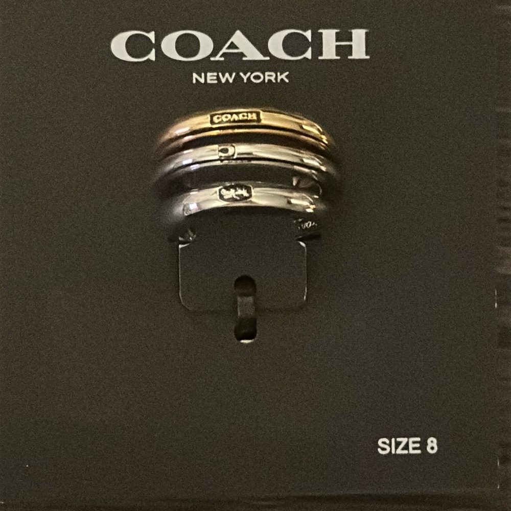 Coach gold and silver 3 piece ring set.  Size 8